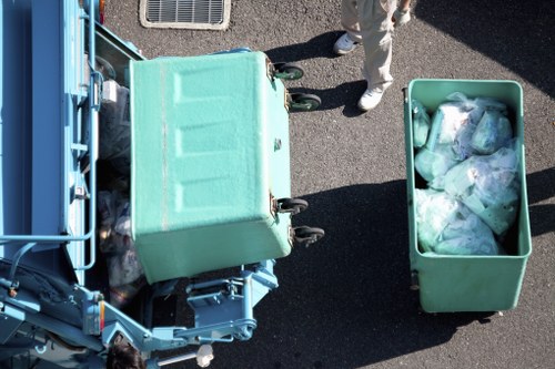 Heavy items being removed during garage clearance